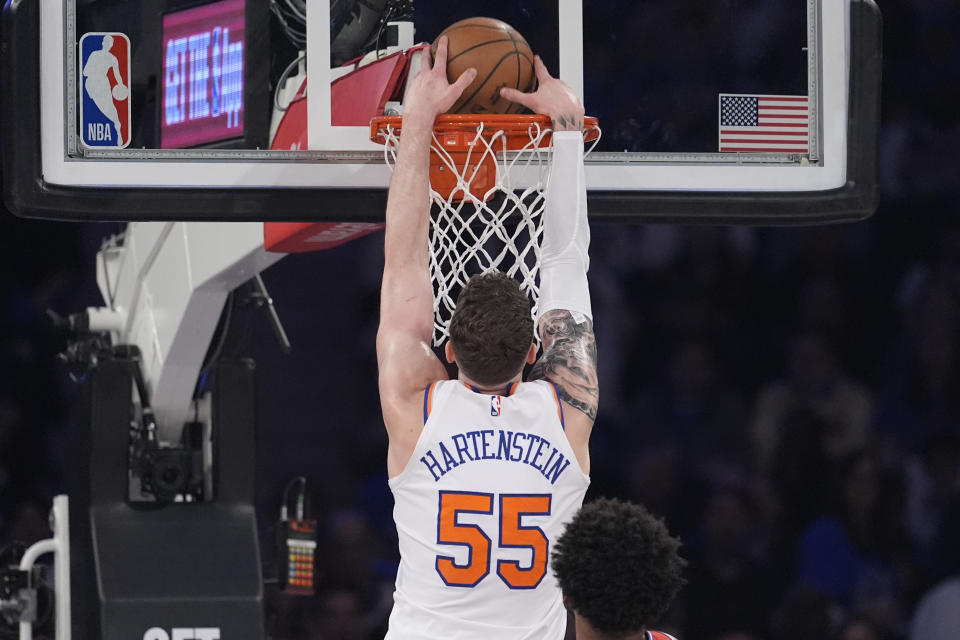 New York Knicks center Isaiah Hartenstein dunks during the first half in Game 1 of an NBA basketball first-round playoff series against the Philadelphia 76ers, Saturday, April 20, 2024, at Madison Square Garden in New York. (AP Photo/Mary Altaffer)