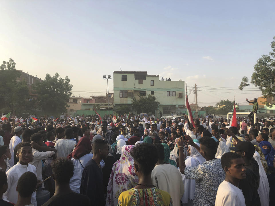 Sudanese people celebrate in the streets of Khartoum after ruling generals and protest leaders announced they have reached an agreement on the disputed issue of a new governing body on Friday, July 5, 2019. The deal raised hopes it will end a three-month political crisis that paralyzed the country and led to a violent crackdown that killed scores of protesters. (AP Photo)