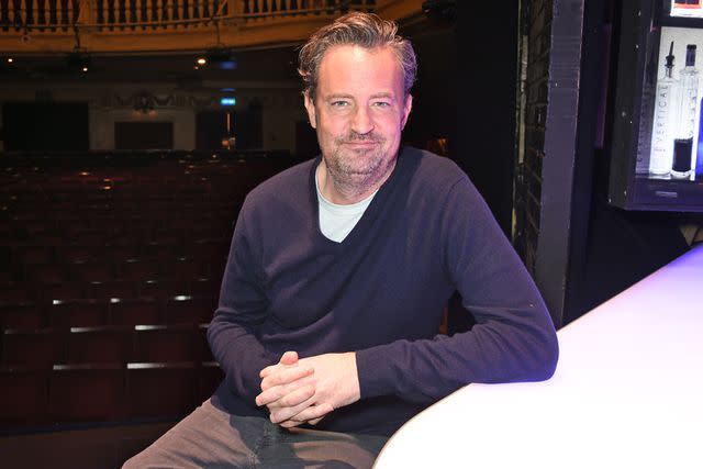 <p>Dave Benett/Getty</p> Matthew Perry poses at a photocall for "The End Of Longing", a new play which he wrote and stars in at The Playhouse Theatre, on February 8, 2016 in London, England