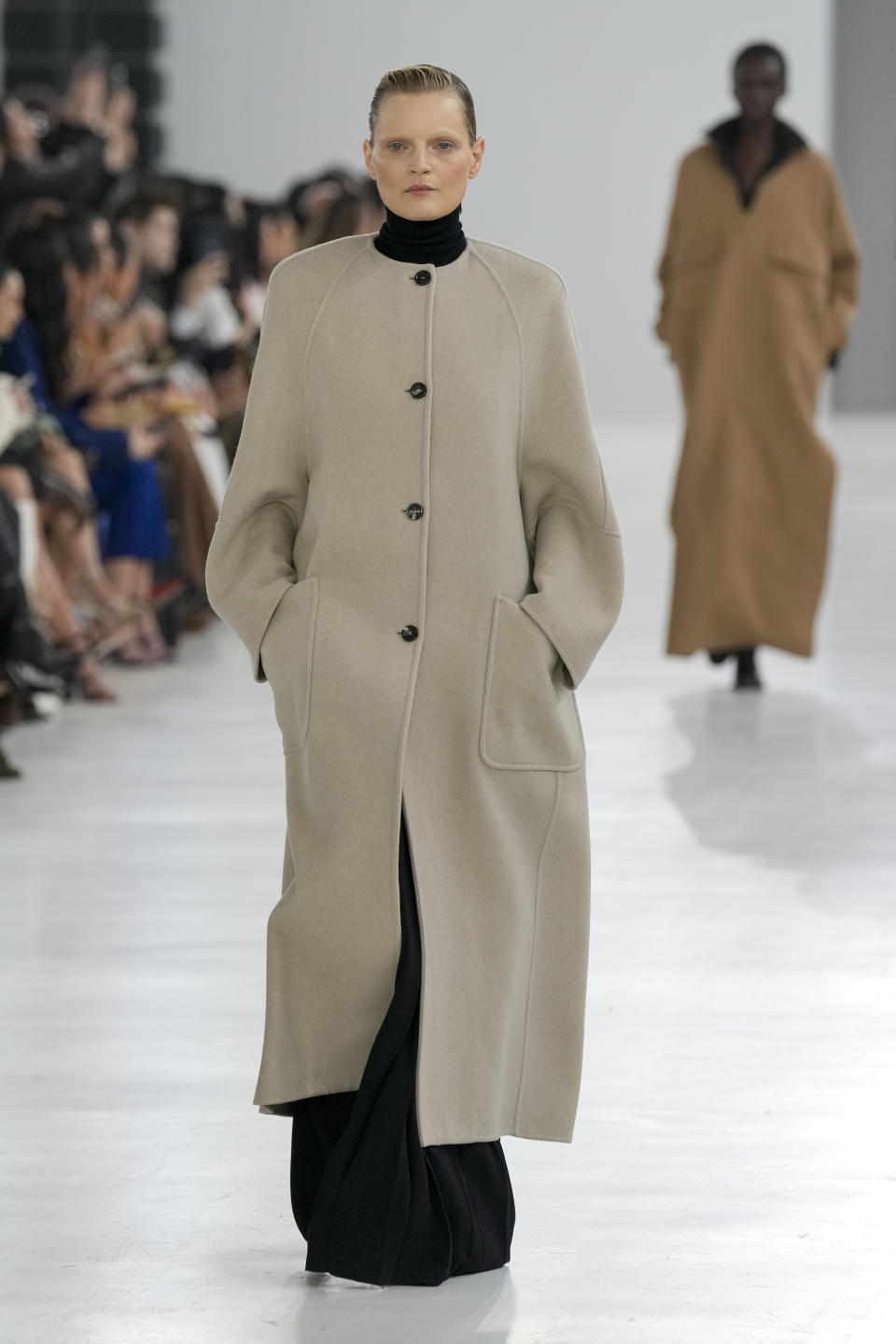 A model wears a creation as part of the Max Mara women's Fall-Winter 2024-25 collection presented in Milan, Italy, Thursday, Feb. 22, 2024. (AP Photo/Antonio Calanni)