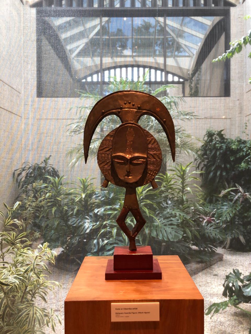 A wood, brass and copper figure from Gabon sits in the sculpture wing of the Kreeger Museum.
