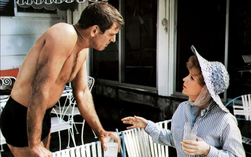 Burt Lancaster and Marge Champion in The Swimmer, 1968, based on Cheever's short story - TCD/Prod.DB / Alamy