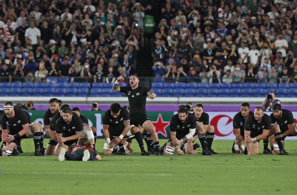 New Zealand's All Blacks perform their haka ahead of the start of the Rugby World Cup Pool B game between New Zealand and South Africa in Yokohama, Japan, Saturday, Sept. 21, 2019. (AP Photo/Shuji Kajiyama)