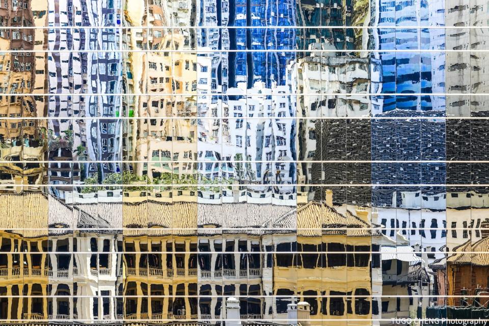鄭振揚利用玻璃幕牆倒映反射出的大館建築群，反映出香港的高密度規劃和新舊建築的強烈對比。受訪者提供