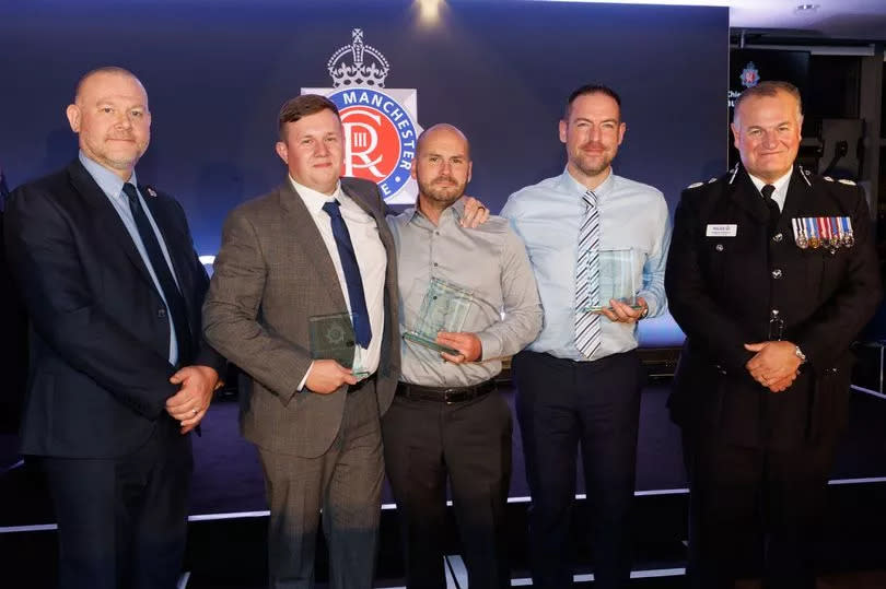 Sergeants Ansell and Foster and Pc Wolstencroft are presented with bravery awards by Chief Constable Stephen Watson -Credit:GMP