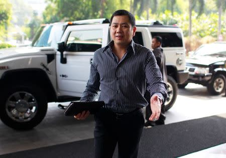 FILE PHOTO: CEO of MNC Group Hary Tanoesoedibjo arrives at his office in Jakarta May 25, 2012. REUTERS/Beawiharta/File Photo