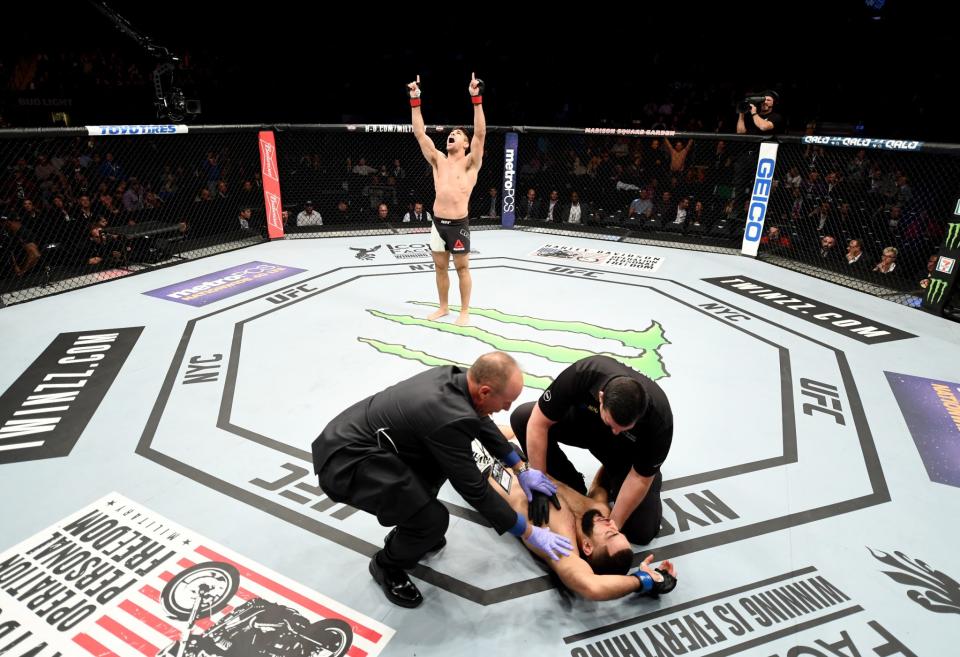 <p>Vicente Luque of Brazil celebrates his win by TKO over Belal Muhammad of the United States in their welterweight bout during the UFC 205 event at Madison Square Garden on November 12, 2016 in New York City. (Photo by Jeff Bottari/Zuffa LLC/Zuffa LLC via Getty Images) </p>