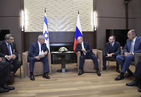 Russian President Vladimir Putin (3rd R) meets with Israeli Prime Minister Benjamin Netanyahu (2nd L) in Sochi, Russia August 23, 2017. Sputnik/Alexei Nikolsky/Kremlin via REUTERS