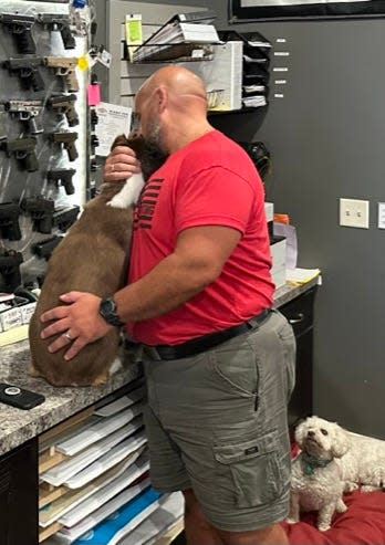 Dan Marcon, owner of Marc-On Shooting in Chippewa Falls, came close to ending his life and credits his dogs for pulling him back from suicide.