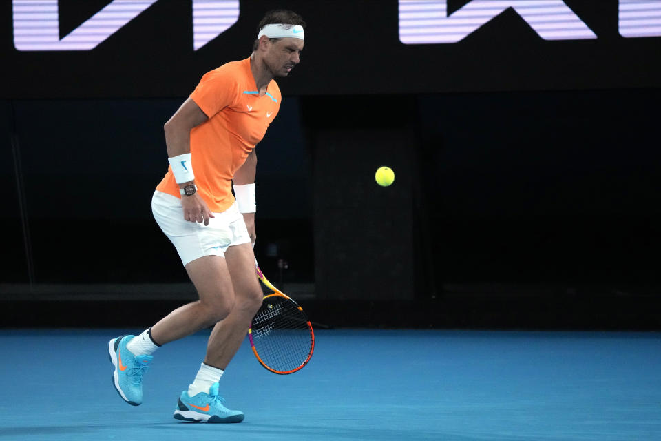Rafael Nadal of Spain reacts during his second round match against Mackenzie McDonald of the U.S., at the Australian Open tennis championship in Melbourne, Australia, Wednesday, Jan. 18, 2023. (AP Photo/Dita Alangkara)