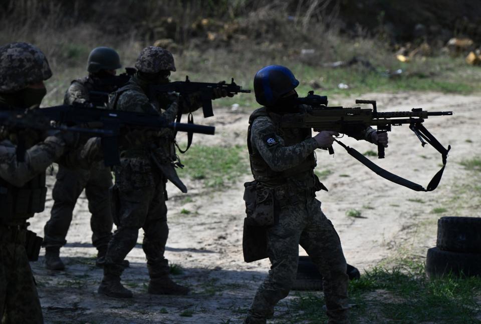 Members of the Siberian battalion within the Ukrainian Armed Forces take part in a military training exercise on a shooting range in Kyiv region on April 10, 2024, amid the Russian invasion of Ukraine.