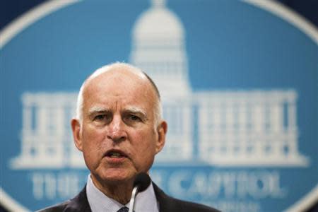 California Governor Jerry Brown unveils his proposed 2014-15 state budget in Sacramento, California, January 9, 2014. REUTERS/Max Whittaker