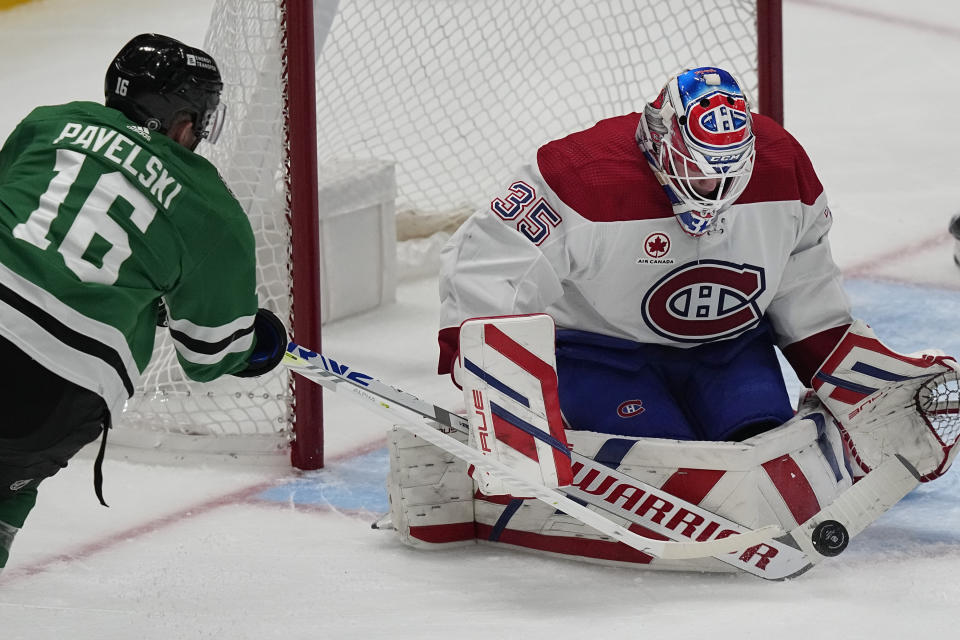 Dallas Stars center Joe Pavelski (16) can't get the puck past Montreal Canadiens goaltender Sam Montembeault (35) during the third period an NHL hockey game in Dallas, Tuesday, Jan. 2, 2024. (AP Photo/LM Otero)