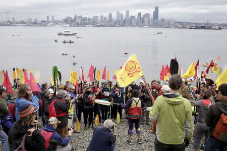 Activists protest the Shell Oil Company's drilling rig Polar Pioneer which is parked at Terminal 5 at the Port of Seattle, Washington May 16, 2015. REUTERS/Jason Redmond