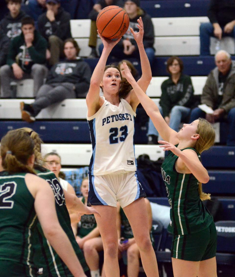 Petoskey's Caroline Guy pulls up for a turnaround jumper over an Alpena player in Friday's game.