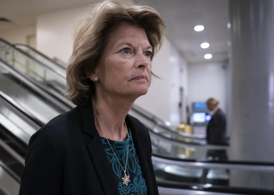 Sen. Lisa Murkowski, R-Alaska, heads to a briefing by Secretary of State Mike Pompeo, Defense Secretary Mark Esper, and other national security officials on the details of the threat that prompted the U.S. to kill Iranian Gen. Qassem Soleimani in Iraq, Wednesday, Jan. 8, 2020 on Capitol Hill in Washington. (AP Photo/J. Scott Applewhite)