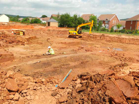 The Monmouth site with the first timber slot (the timber beams have since decayed, leaving behind clay-filled trenches) before excavation.