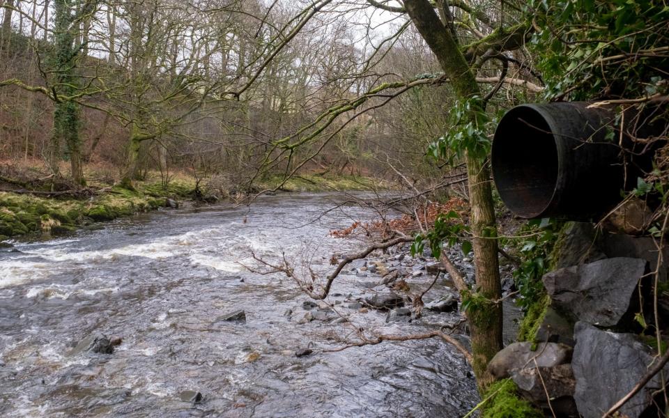 An outflow pipe discharging wastewater into the River Rawthey in Sedbergh, Cumbria