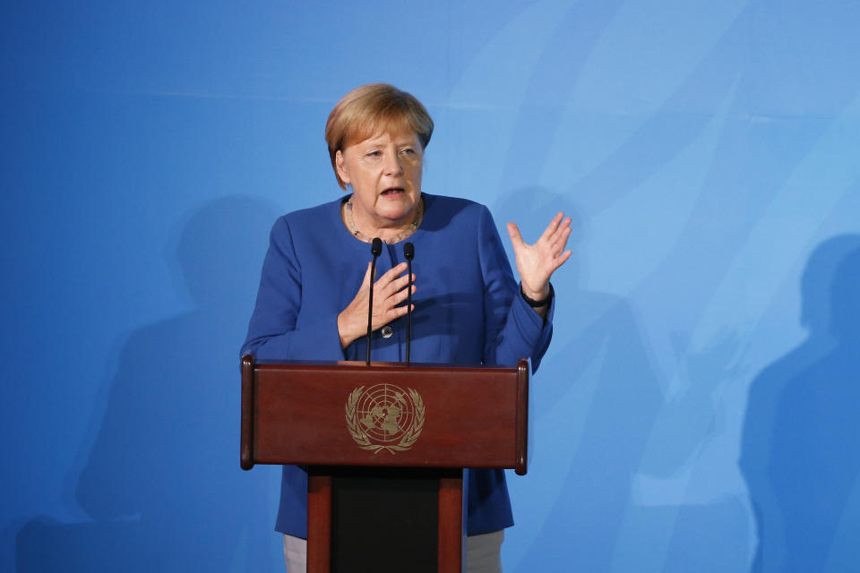 Germany's Chancellor Angela Merkel addresses the Climate Action Summit in the United Nations General Assembly, at U.N. headquarters, Monday, Sept. 23, 2019. (AP Photo/Jason DeCrow)