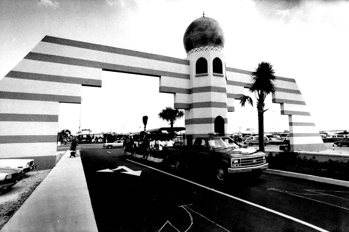 The entrance of the Opa-locka Hialeah Flea Market. A tram carrying customers back to the parking lot.