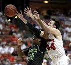Wisconsin forward Frank Kaminsky (44) reaches over Baylor forward Royce O'Neale (00) during the second half in an NCAA men's college basketball tournament regional semifinal, Thursday, March 27, 2014, in Anaheim, Calif. (AP Photo/Jae C. Hong)