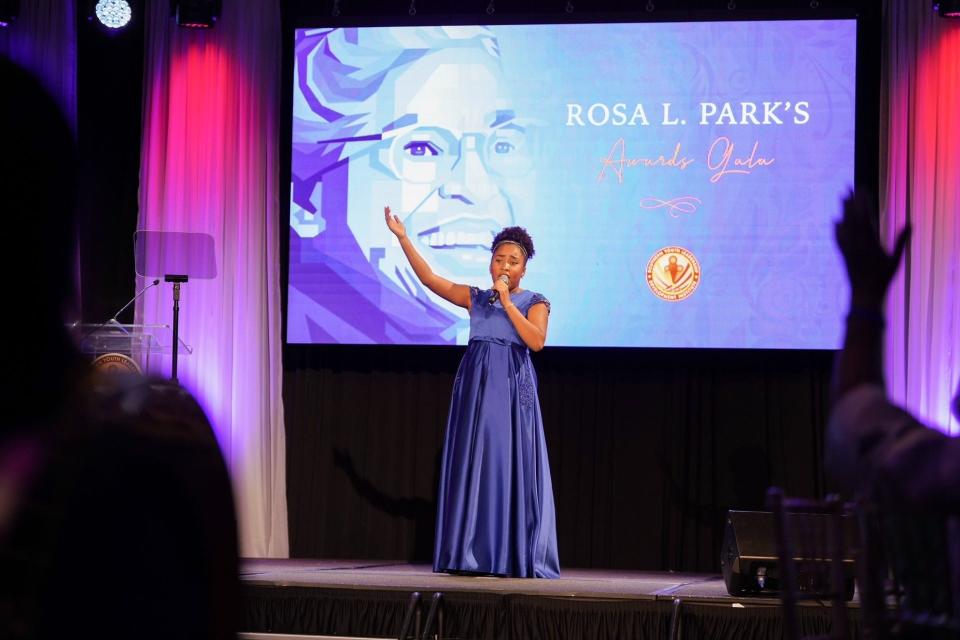 Victory Brinker sings during the Rosa L. Parks Awards Gala