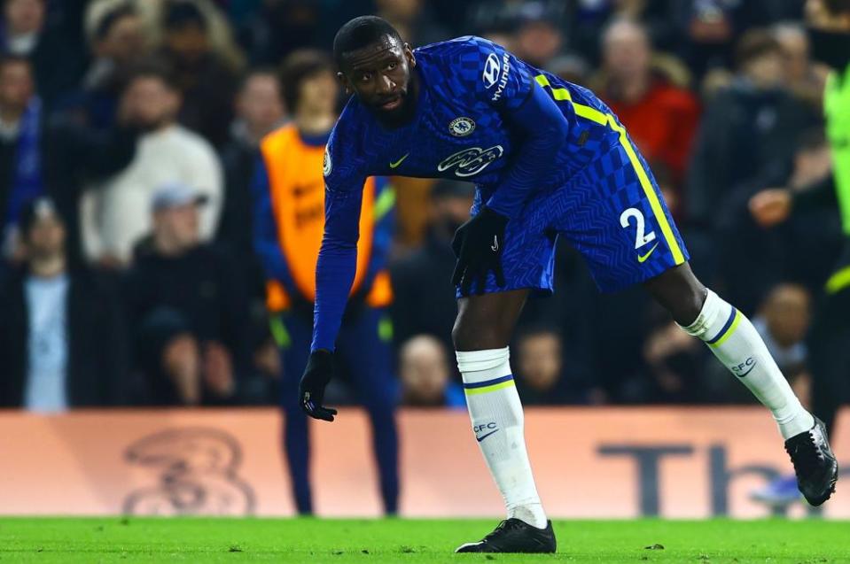 Chelsea’s Antonio Rüdiger picks up an object thrown at him from the crowd on Sunday.