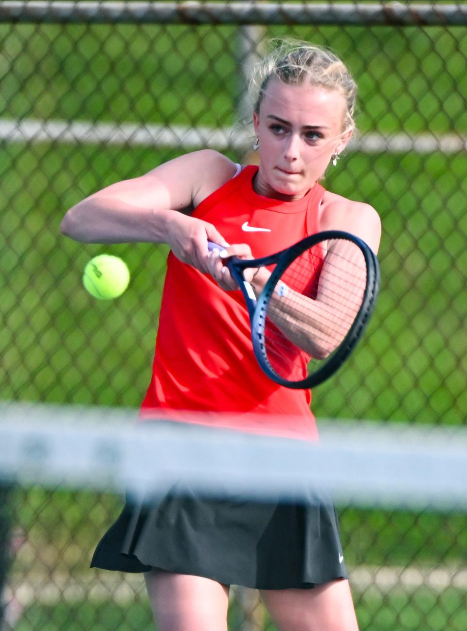 Edgewood’s Macy Vaughn hits a backhand during her No. 1 singles match against Bloomington North’s Keira Murphy during the tennis match at North on Tuesday, April 16, 2024.