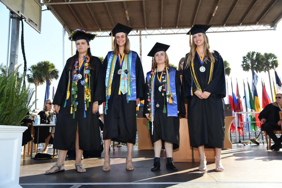 Elizabeth Bonker (left) at Rollins College's commencement.