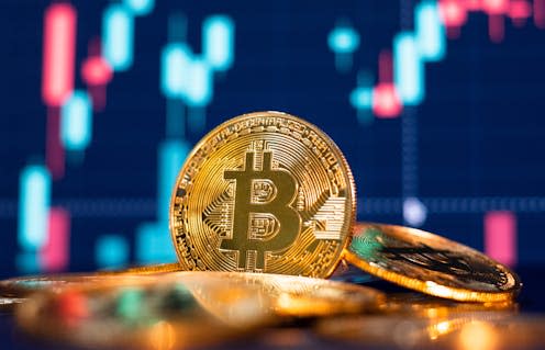 <span class="caption">The bitcoin halving happens only once every four years.</span> <span class="attribution"><a class="link " href="https://www.shutterstock.com/image-photo/bitcoin-gold-coin-defocused-chart-background-1897558246" rel="nofollow noopener" target="_blank" data-ylk="slk:tungtaechit/Shutterstock;elm:context_link;itc:0;sec:content-canvas">tungtaechit/Shutterstock</a></span>