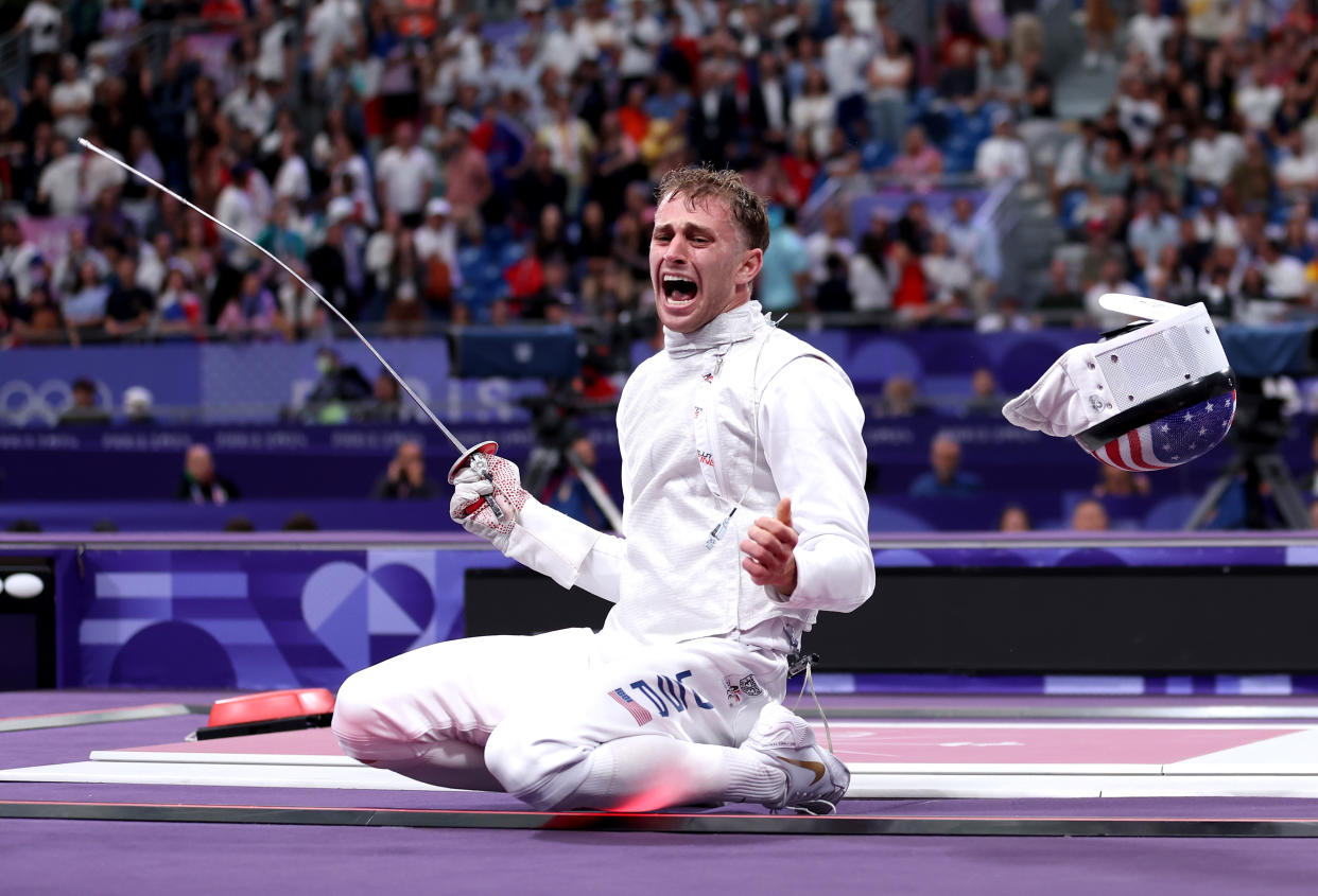 PARIS, FRANCE - JULY 29: Nick Itkin of Team United States celebrates victory in the Menâ€™s Foil Individual Table of 8 match between Guillaume Bianchi of Team Italy and Nick Itkin of Team United States on day three of the Olympic Games Paris 2024 at Grand Palais on July 29, 2024 in Paris, France. (Photo by Carl Recine/Getty Images)