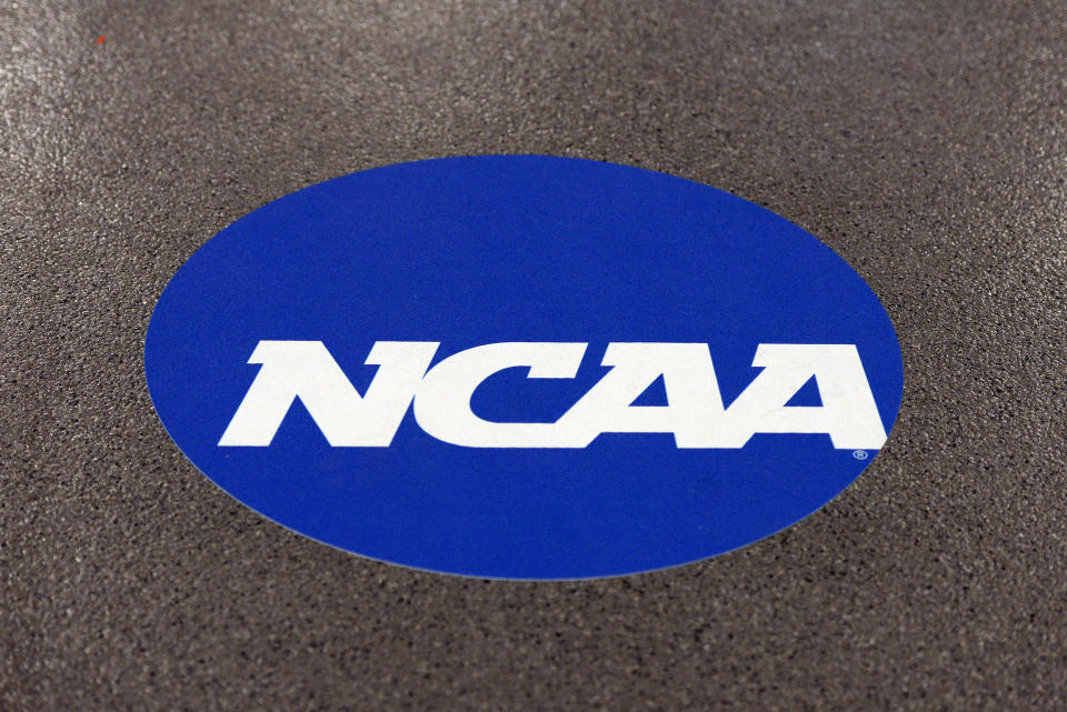 CHAMPAIGN, IL - APRIL 19: A NCAA logo is displayed on the floor during the NCAA Men's Gymnastics Championship on April 19, 2019, at the State Farm Center in Champaign, Illinois. (Photo by Michael Allio/Icon Sportswire via Getty Images)