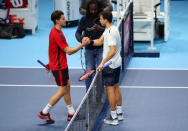 Tennis - ATP World Tour Finals - The O2 Arena, London, Britain - November 13, 2017 Bulgaria’s Grigor Dimitrov (R) shakes the hand of Austria’s Dominic Thiem after their group stage match REUTERS/Hannah McKay