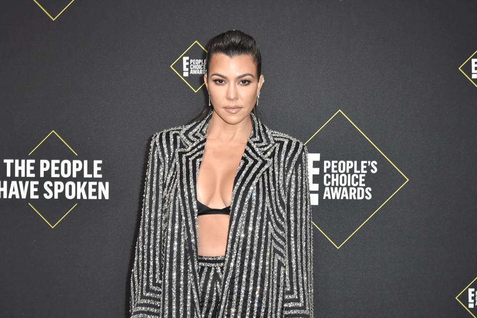 SANTA MONICA, CALIFORNIA - NOVEMBER 10: Kourtney Kardashian attends 2019 E! People's Choice Awards - Arrivals at The Barker Hanger on November 10, 2019 in Santa Monica, California.  (Photo by David Crotty/Patrick McMullan via Getty Images)