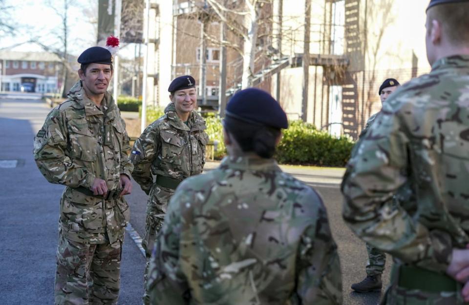 Lt Col Shamus Kelly and his wife Lt Col Lyndsey Kelly talk to soldiers (Steve Parsons/PA) (PA Wire)