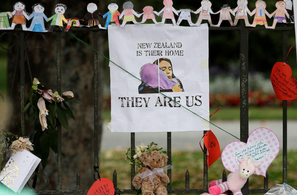 A poster featuring a drawing of Prime Minister Jacinda Ardern hangs on a wall at the Botanical Gardens in Christchurch, New Zealand, Thursday, March 21, 2019.