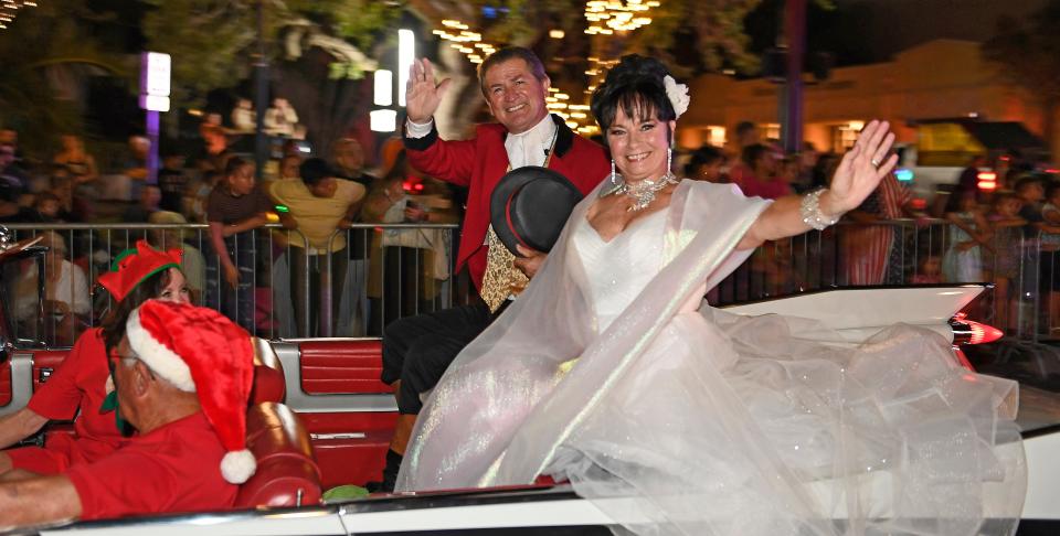 Pedro Reis and Dolly Jacobs-Reis, founders of the Circus Arts Conservatory, which marks the 25th anniversary of Circus Sarasota in 2023. They are seen riding in the 2022 Sarasota Holiday Parade.