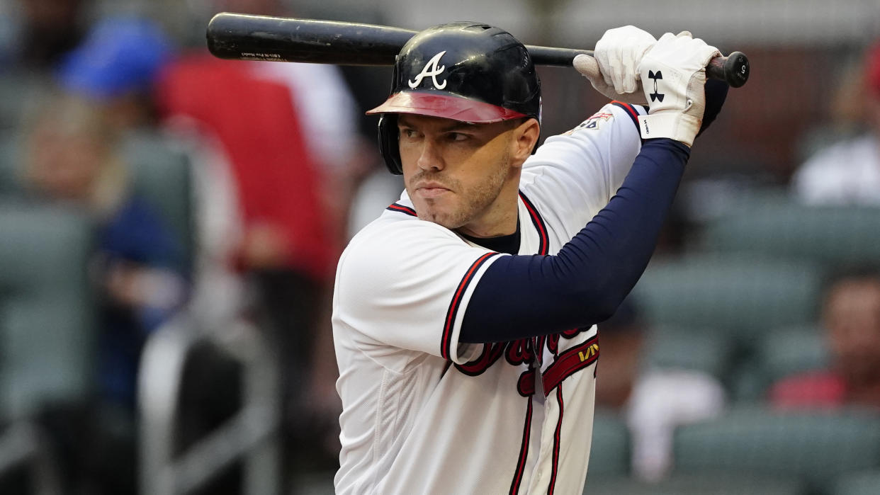 Atlanta Braves first baseman Freddie Freeman (5) bats against the San Diego Padres during a baseball gameTuesday, July 20, 2021, in Atlanta. (AP Photo/John Bazemore)