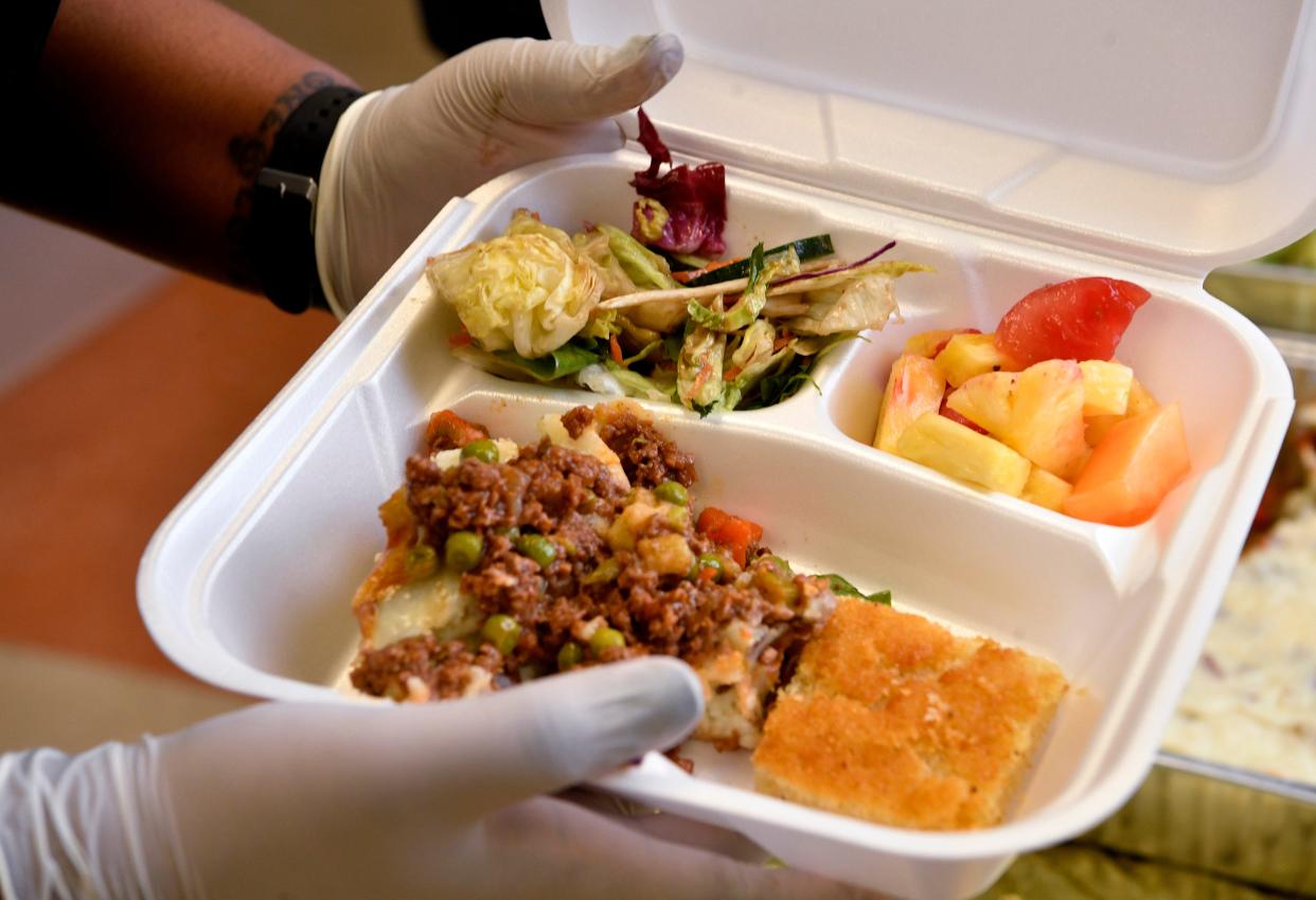 Shepards Pie, salad and fruit was the lunch provided by The Nashville Food Project to FiftyForward Bordeaux members from 11 – noon on Tuesday. The center also passed out food bags and fresh flowers to seniors that came by and those to whom they delivered in Nashville, Tenn. Tuesday, March 17, 2020.