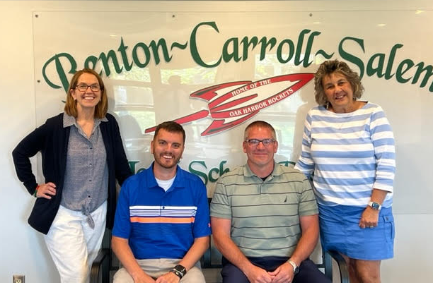 Fremont the left, Cheryl Schell, Principal of Oak Harbor High School; Brian Kaser, new Assistant Principal at Oak Harbor High School; Geoff Halsey, new Director of Administrative Services; and incoming Superintendent Cathy Bergman.