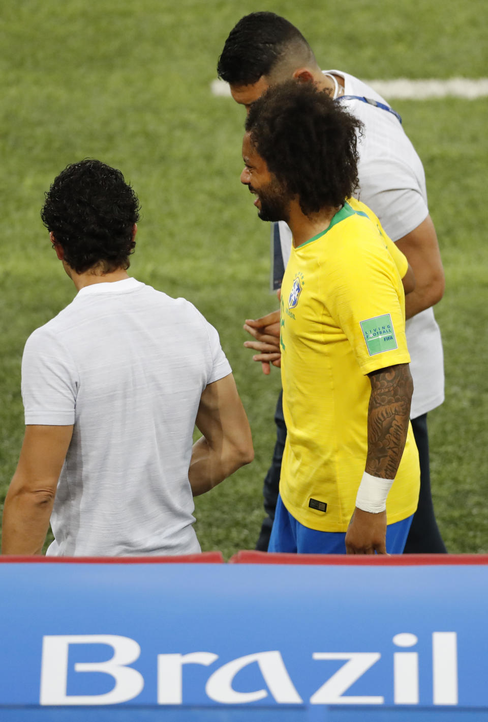 <p>Brazil’s Marcelo leaves the pitch after suffering an injury during the group E match between Serbia and Brazil, at the 2018 soccer World Cup in the Spartak Stadium in Moscow, Russia, Wednesday, June 27, 2018. (AP Photo/Antonio Calanni) </p>