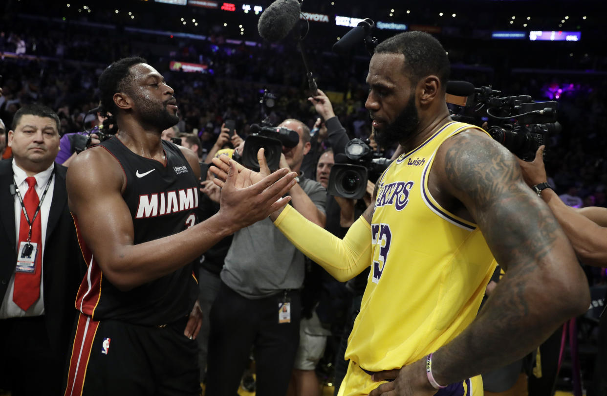 LeBron James told Dwyane Wade after their final game against each other on Monday that it was either ending in Los Angeles or at Madison Square Garden — hinting that he was considering signing with the New York Knicks. (AP Photo/Marcio Jose Sanchez)