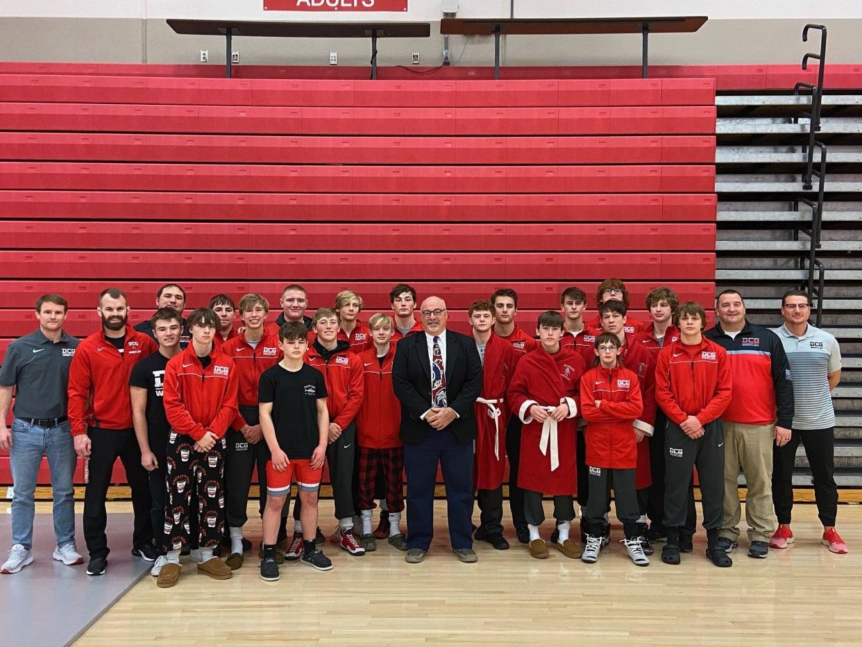 The Dallas Center-Grimes wrestling team poses for a photo after taking third place at the Andy Davidson DCG Mustang Invite on Saturday, Dec. 3, 2022.