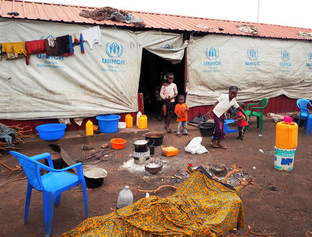 Children walk out of tents in Cacanda refugee camp in Dundo, Angola, September 12, 2017. REUTERS/Stephen Eisenhammer/Staff