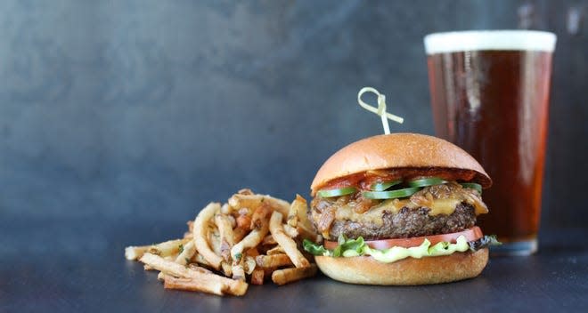 Hometown burger favorite Hopdoddy Burger Bar is acquiring Grub Burger Bar, based in Bryan, Texas. Together, the two plan to accelerate expansion plans. (Courtesy of Hopdoddy Burger Bar)