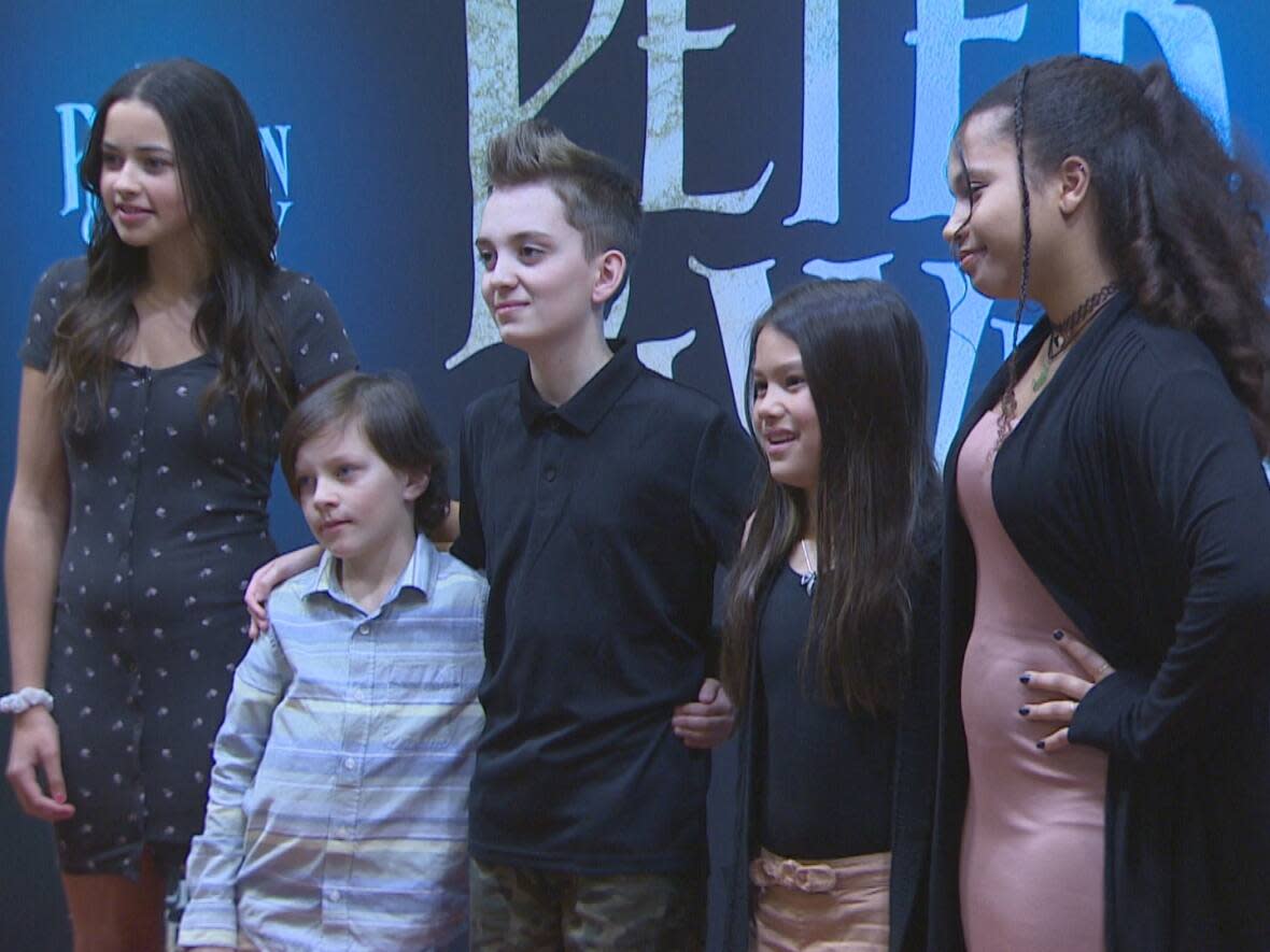 The red carpet rolled out in St. John's on Monday night for the premiere of Peter Pan & Wendy. Those in attendance included seven-year-old Jax Ryder, second from the left, who was the only actor from Bonavista to act in the movie. (Danny Arsenault/CBC - image credit)