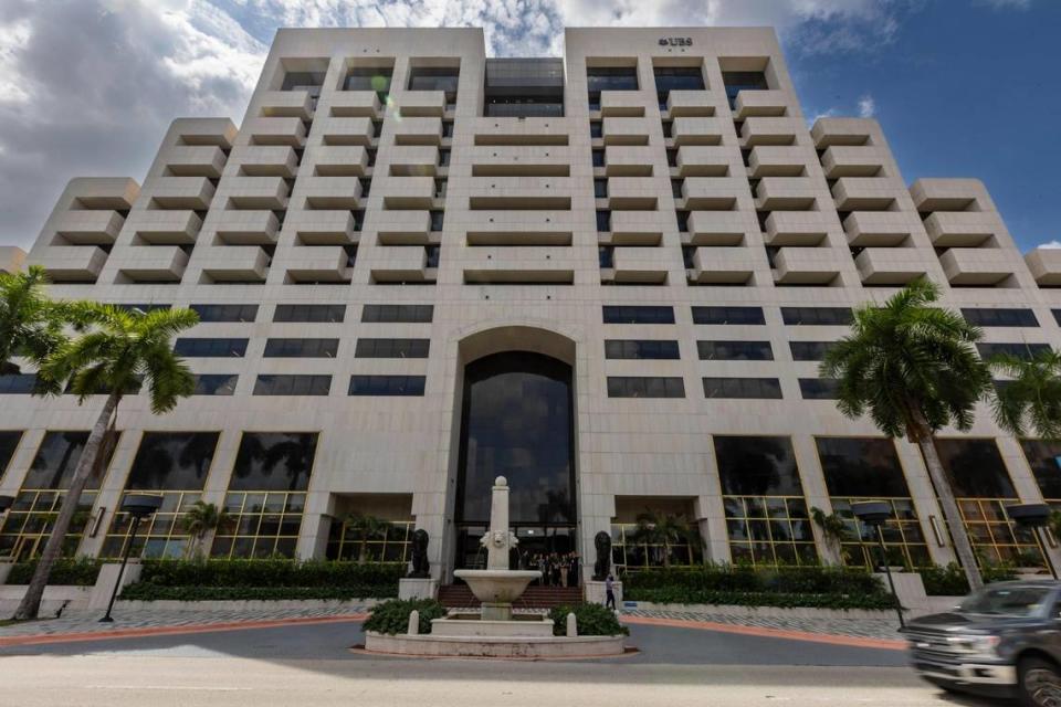 The pyramid-shaped office building at 550 Biltmore Way is a recognizable piece of the Coral Gables skyline. In December, the lion statues that stand guard at the building’s entrance typically wear Santa hats.