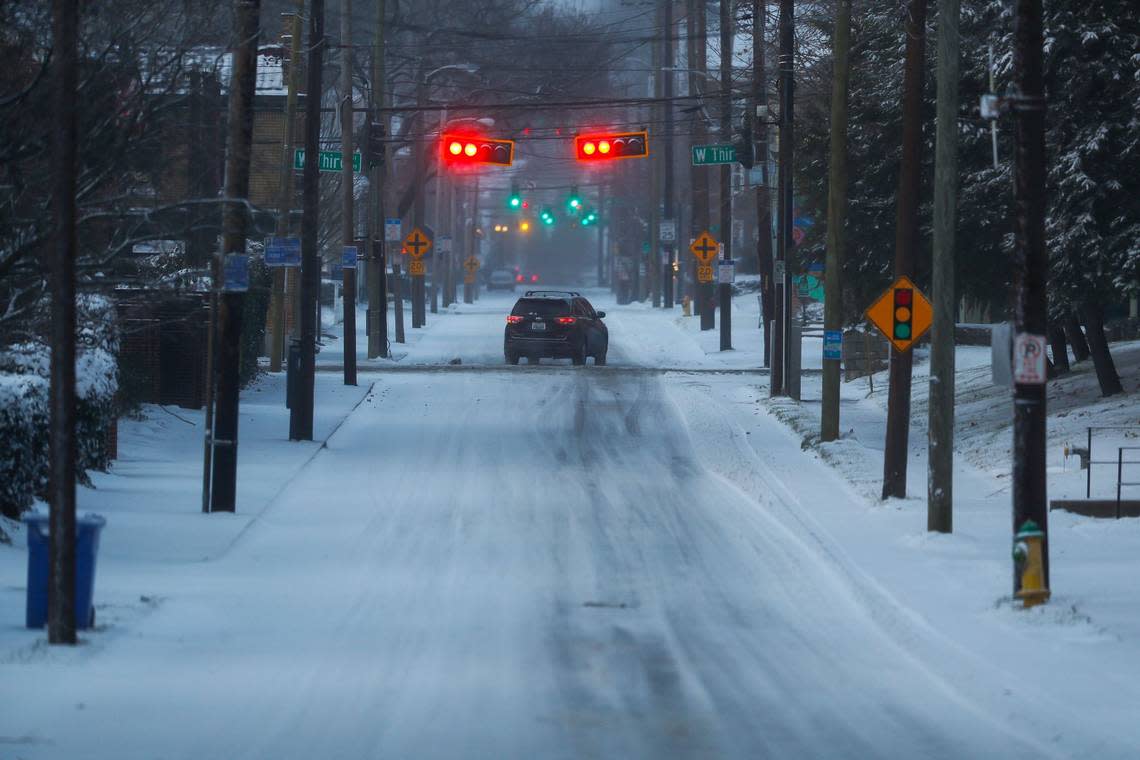 Snow covers streets in Lexington as Kentucky deals with freezing temperatures and precipitation on Friday, Dec. 23, 2022.