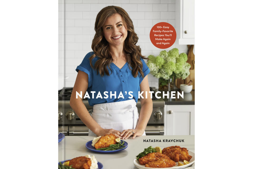 This cover image released by Clarkson Potter shows "Natasha's Kitchen: 100+ Easy Family-Favorite Recipes You'll Make Again and Again: A Cookbook" by Natasha Kravchuk. (Clarkson Potter via AP)