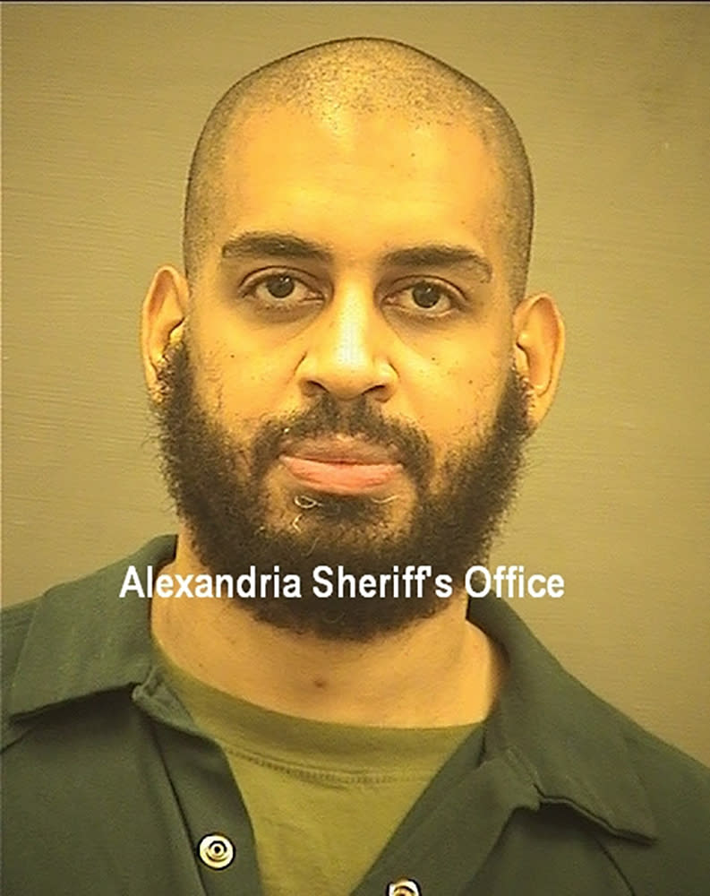 In this photo provided by the Alexandria Sheriff's Office is Alexanda Kotey who is in custody at the Alexandria Adult Detention Center, Wednesday, Oct. 7, 2020, in Alexandria, Va. Two Islamic State militants from Britain, El Shafee Elsheikh and Kotey, were brought to the U.S. on Wednesday to face charges in a gruesome campaign of torture, beheadings and other acts of violence against four Americans and others captured and held hostage in Syria, the Justice Department said. They made their first appearance on Wednesday in federal court in Alexandria, Va. (Alexandria Sheriff's Office via AP)